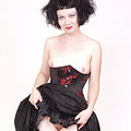 Pierced vintage glam goth in corset flowy skirt