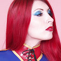 Redhead shows tits in tight blue latex dress