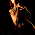 ultra glamorous pierced redhead in see thru dress
