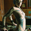 Tattoo punk gets stripped and chained up in game room