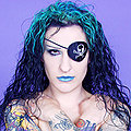 Halloween Jen Vixen Gothic tattooed pirate girl smirks sexy