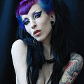 Razor Candi Gothic pin-up super-star in torn fishnets and purple hair